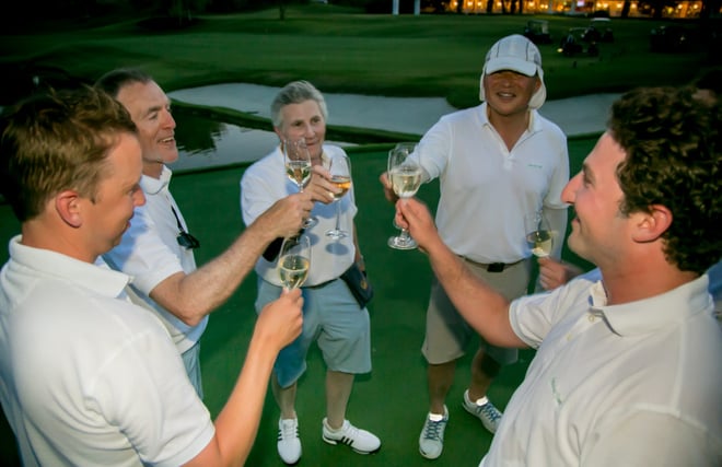 Golfers celebrating the completion of Racing the Sun for Youth on Course