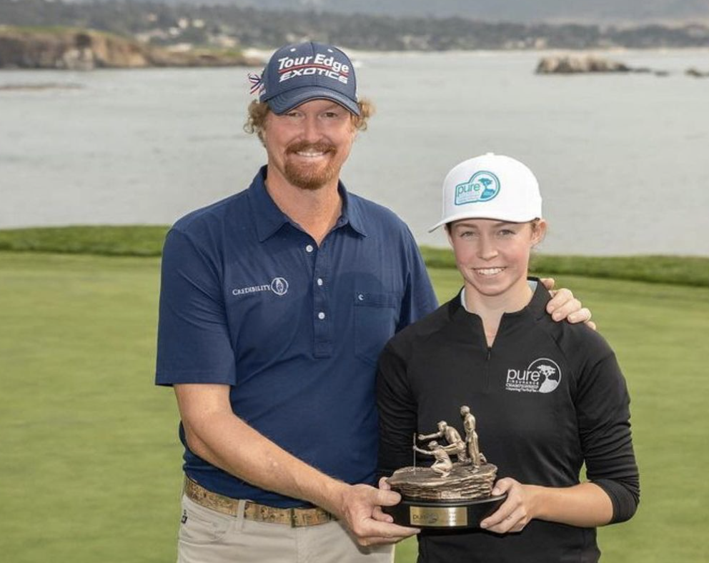 Youth on Course member Sydney from First Tee Monterey receiving trophy as the winner of the 2021 Pebble Beach ProAm