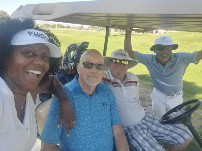 Roberto and Teresa Correa enjoying time with friends at the golf course