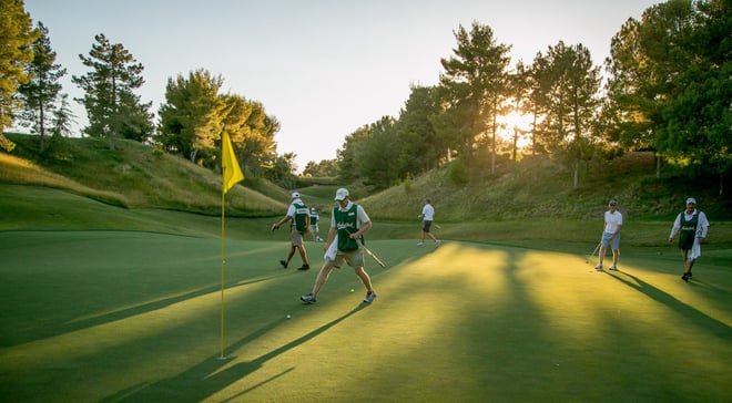 Golfers on the green course for Racing the Sun for Youth on Course